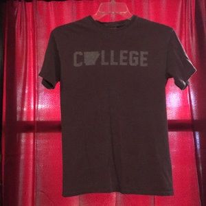 University of Arkansas t-shirt.